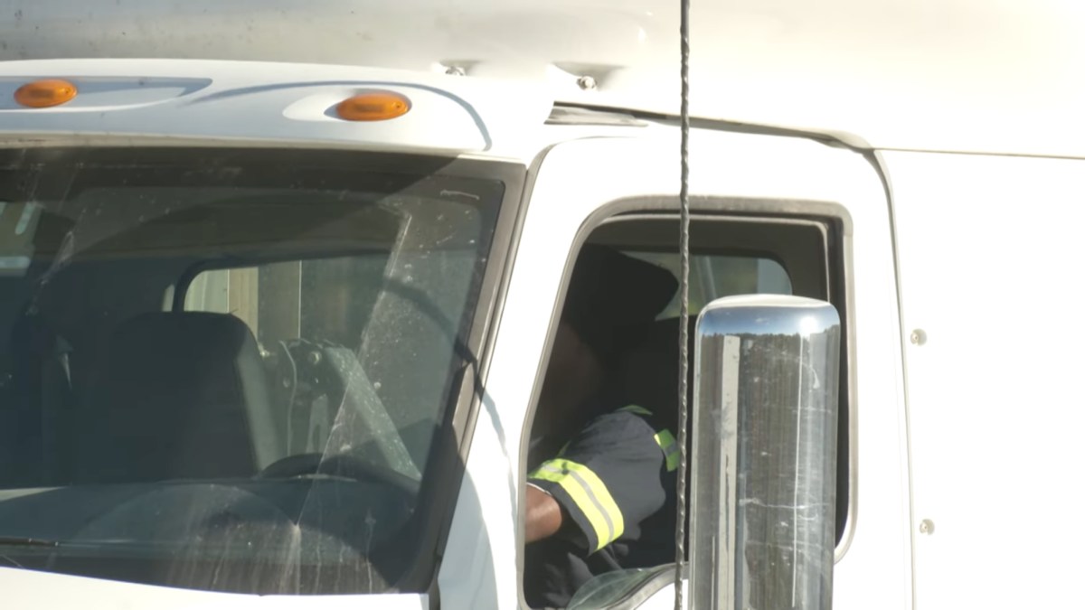 Trainees learn to back a big rig at trucking school